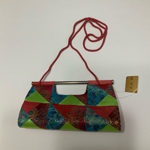 Beautiful Le Regale Clutch with Strap.